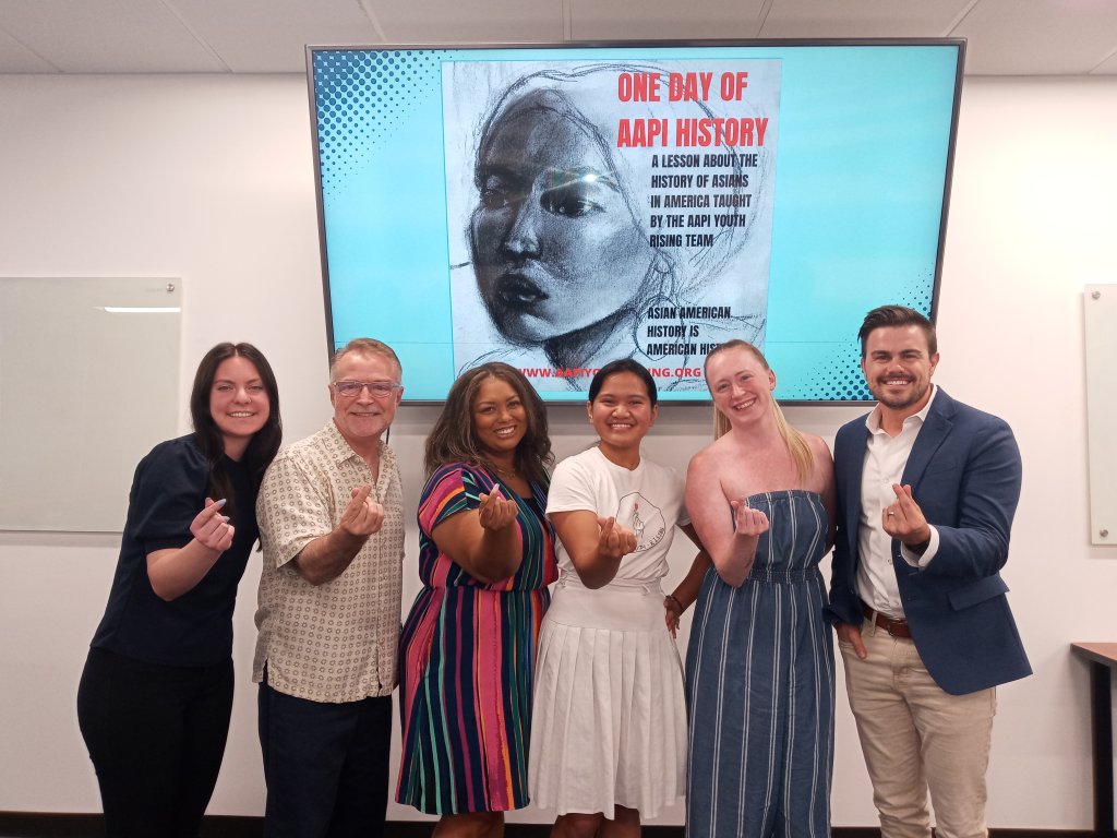 Members of the Diversity, Equity, and Inclusion Committee along with Johanna Villanueva all giving the “heart” sign with their thumb and forefinger after Johanna presented about AAPI history.